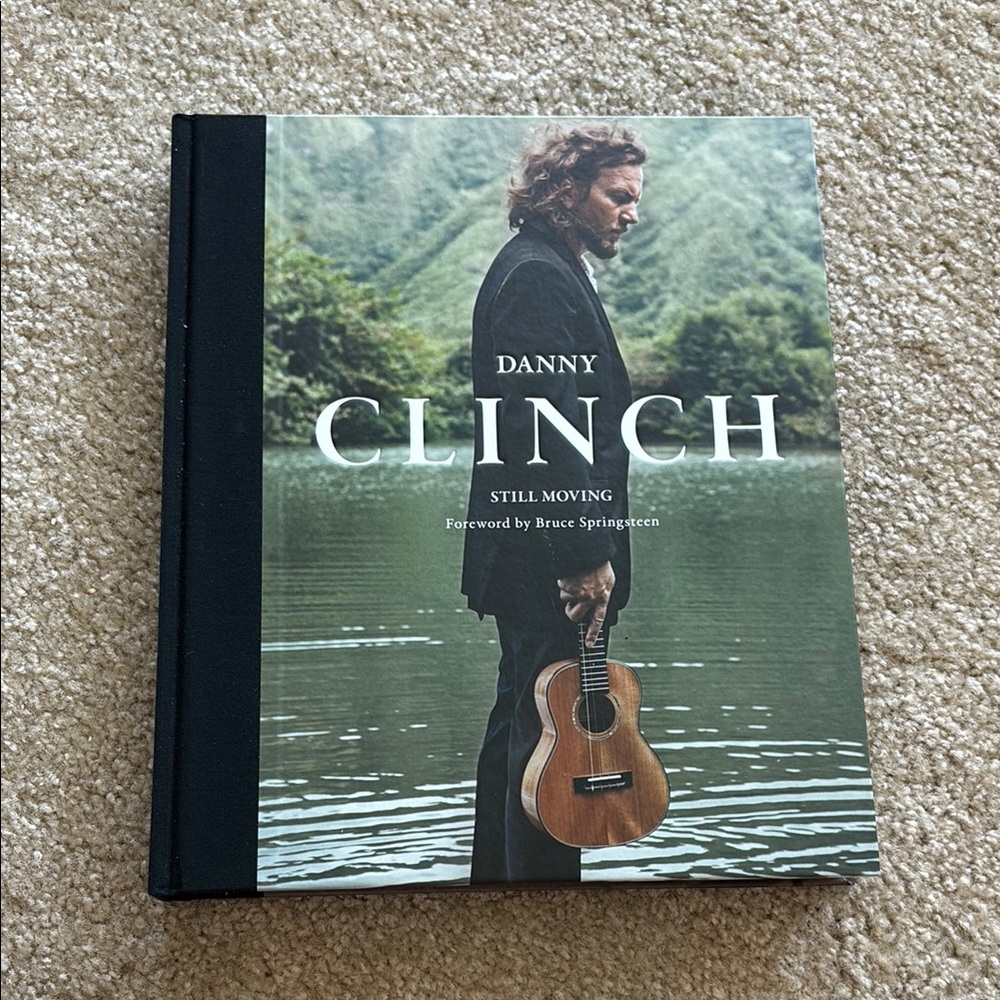 Still Moving Photography Book with Black and Green Cover